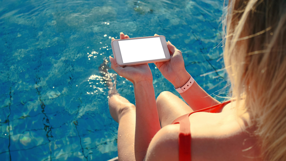 Can I use my iPhone in a swimming pool?